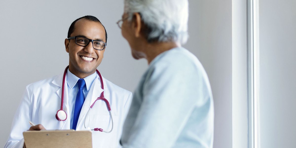 Doctor smiling at patient during appointment