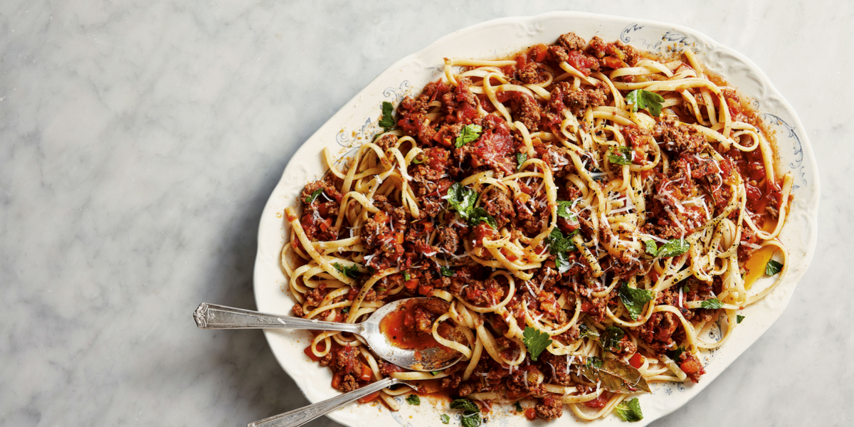 plate of pork bolognese on a countertop